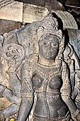 Prambanan - Durga Mahisasuramardini (slayer of the bull demon), in north chamber of Shiva Temple. She is said to be the princess Loro Djonggrang, who was cursed by her deceived lover, prince Bandung, and turned into stone. 